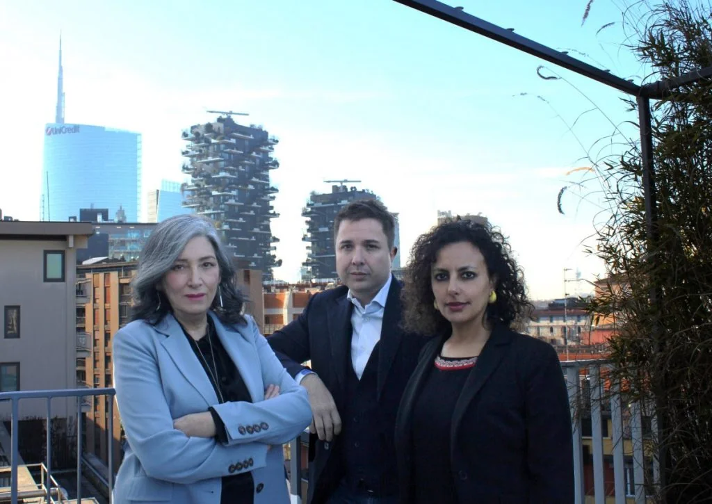 Donatella Cambosu, Massimo Ferri and Sara Serafini on a terrace in Milan